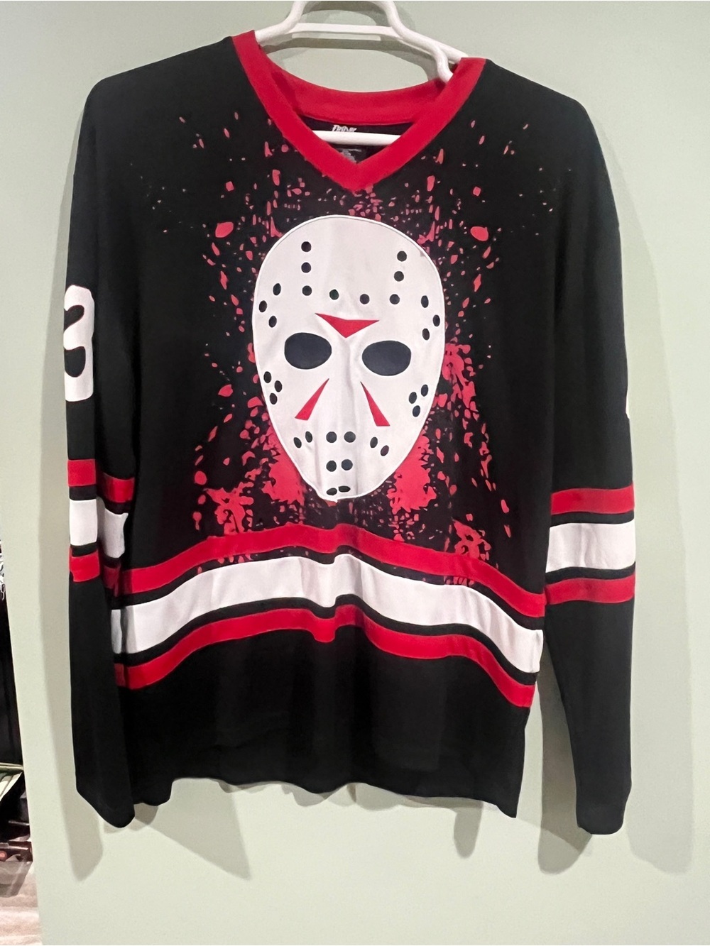 Black V-Neck Men's Graphic Hockey Mask Sweater with Red & White Accents